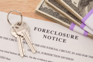 Foreclosure Defense Lawyer Connecticut - House Keys, Stack of Money and Foreclosure Notice - Cash for Keys Program